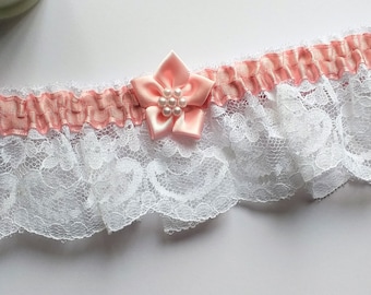 Lace Bridal Garter. White or Ivory with Pink trim & satin flower with pearls.