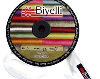 May include: A spool of white ribbon with a label that reads "Biyelli" and "Made in Türkiye". The spool is labeled with the text "EN: 2 METRE: 25 RENK: D1".