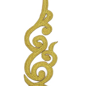 May include: Gold embroidered trim featuring a decorative floral design. The trim is made from a soft, flexible material and can be used for a variety of craft projects.