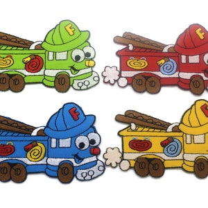 May include: Four embroidered iron-on patches of cartoon fire trucks in different colors: green, red, blue, and yellow. Each truck has a smiling face, a ladder, a hose, and the letter "F" on the top.