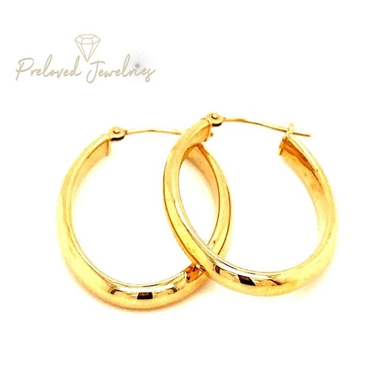Oval-Shaped 14k Gold Hoops - image 1