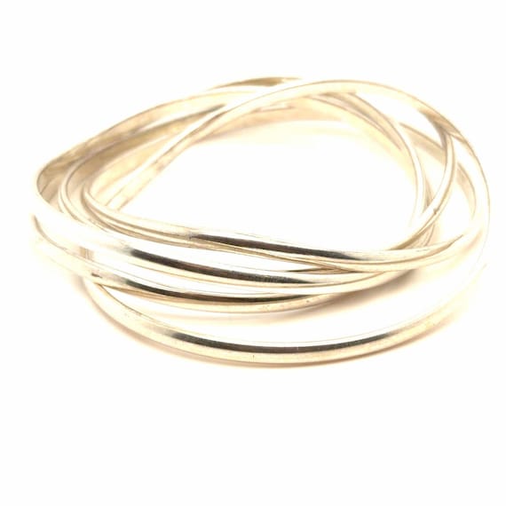 Silver Tone Interlocking Bracelet - image 1
