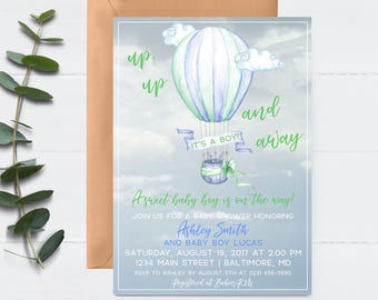 May include: A blue and green watercolor hot air balloon with the text "up up and away" and "it's a boy" on a light blue background. The text "A sweet baby boy is on the way!" is below the balloon. The invitation includes the text "Ashley Smith and Baby Boy Lucas" and the date and time of the event.