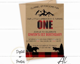 May include: A brown and red plaid birthday invitation with a silhouette of mountains, a bear, and a moose. The text reads "Flannel up for some fun! Our little lumberjack is turning one. Join us to celebrate Owen's 1st birthday! Saturday, October 9th, 1234 Main Street, Baltimore, MD, 3:00 to 5:00 PM. RSVP by October 1st to Ashley at (123) 456-7890."