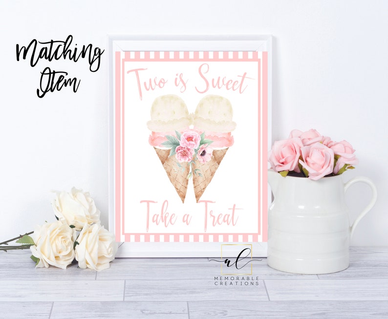May include: Pink and white printable sign with the text "Two is Sweet" and a graphic of two ice cream cones with pink flowers. The text "Take a Treat" is below the ice cream cones. The sign has a pink and white striped border.
