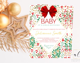 May include: A Christmas-themed baby shower invitation with a red bow and a white background with green and red holly sprigs. The text reads "Baby It's Cold Outside" and includes the name "Julianne Smith".