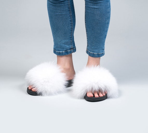 white slides with fur