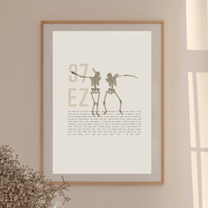 May include: A beige printable wall art print with a black and white illustration of two skeletons dancing. The print features the text "37 EZ" and a passage from the Bible, Ezekiel 37:1-14.