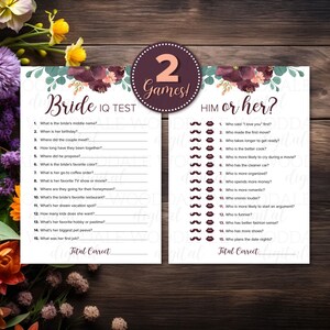 May include: Two bridal shower games, "Bride IQ Test" and "Him or Her?", are displayed on white cards with floral accents. The games feature fill-in-the-blank questions and are set against a dark wood background.