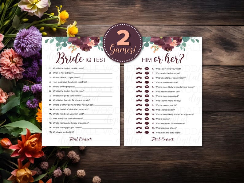 May include: Two bridal shower games, "Bride IQ Test" and "Him or Her?", are displayed on white cards with floral accents. The games feature fill-in-the-blank questions and are set against a dark wood background.