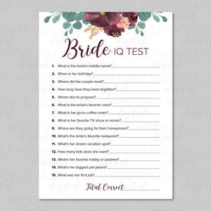 May include: A white bridal shower game card with a floral design at the top. The card features the text "Bride IQ TEST" and prompts for the bride's middle name, birthday, and other personal details. The card is designed for a wedding or bridal shower.