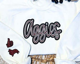 Sudadera con bordado de Aggie brillante