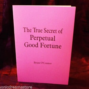 May include: A pink book with the title "The True Secret of Perpetual Good Fortune" by Brian O'Connor.