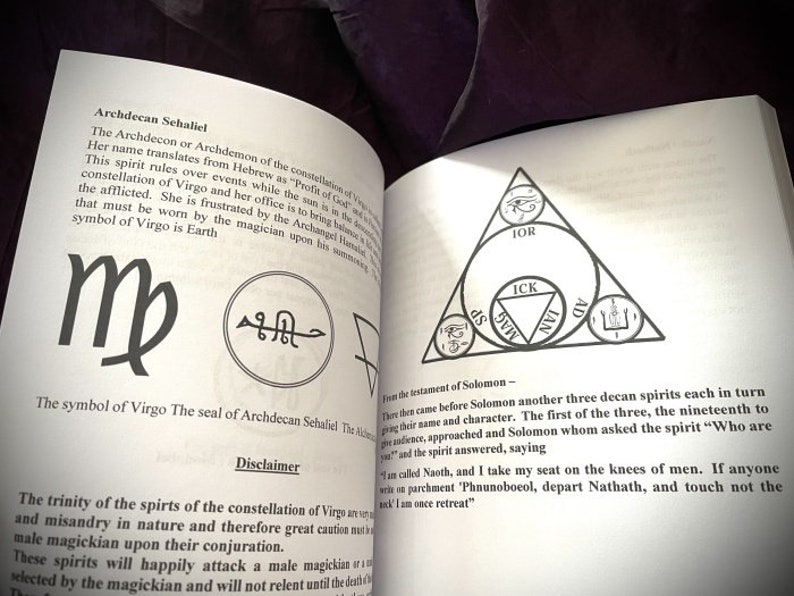 May include: A black and white image of a book page with text about the Archdecon Sehaliel, a spirit associated with the constellation Virgo. The page includes a symbol of Virgo, a seal, and a diagram of a triangle with symbols inside.