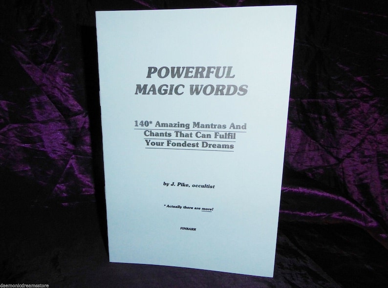May include: A blue book with the title "POWERFUL MAGIC WORDS" and the subtitle "140* Amazing Mantras And Chants That Can Fulfil Your Fondest Dreams". The book is by J. Pike, occultist.