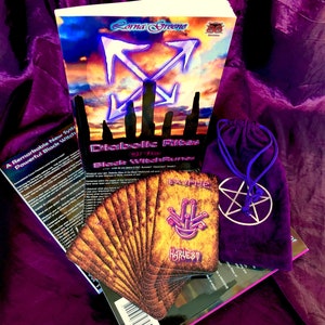 May include: A purple velvet bag with a silver pentagram design, a book titled "Diabolic Rites of the Black Witch Runes" by Lorna Greeno, and a deck of tarot cards with a purple and yellow design.