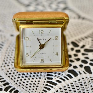 1960s beige By EUROPA Travel Clock, Mid-century modern Mechanical Alarm Clock made in Germany, vintage home office decor.