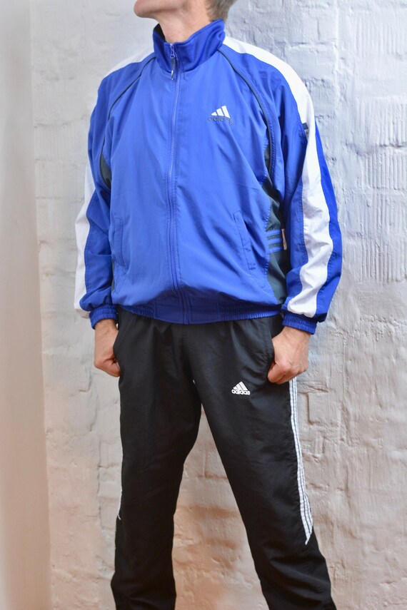 blue and pink adidas tracksuit