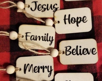 Small wood tag ornaments - sold in increments of 12