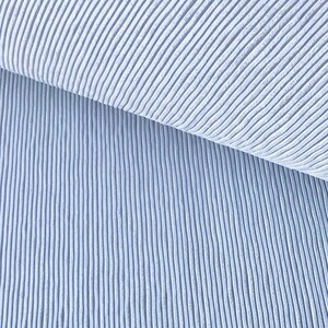 May include: Close-up of a light blue ribbed fabric. The fabric has a subtle texture and a smooth, even surface.
