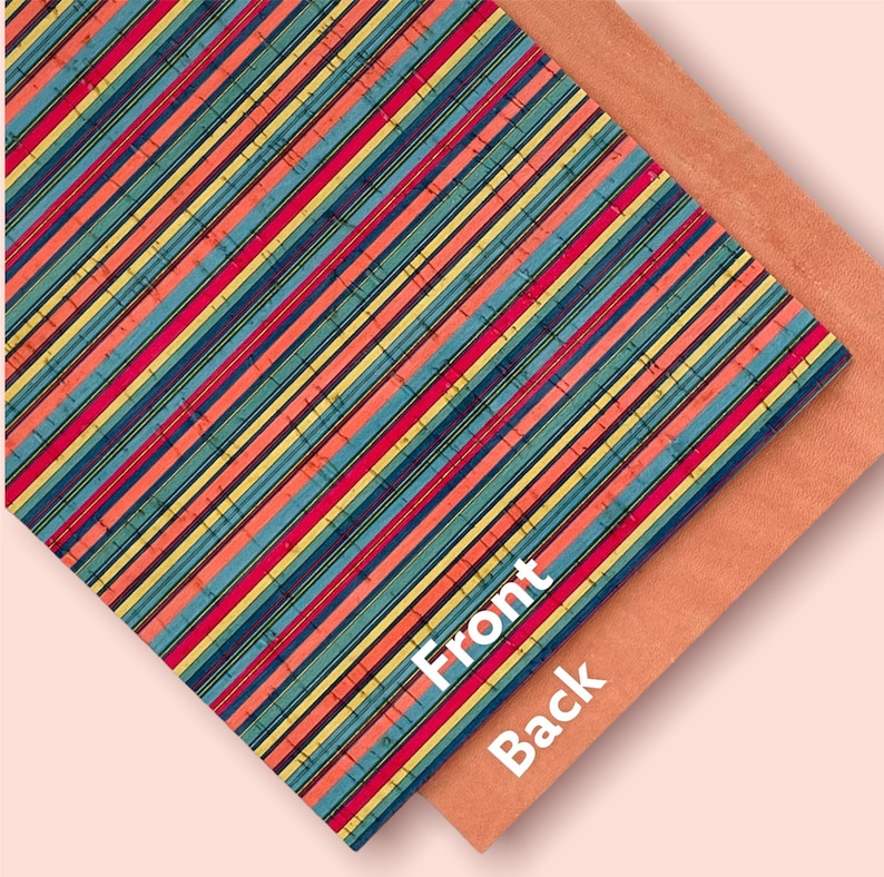 May include: A close-up of a sheet of cork fabric with a colorful striped pattern. The fabric has a textured surface and is folded over to show the back side, which is a solid light brown color. The words "Front" and "Back" are printed on the fabric.