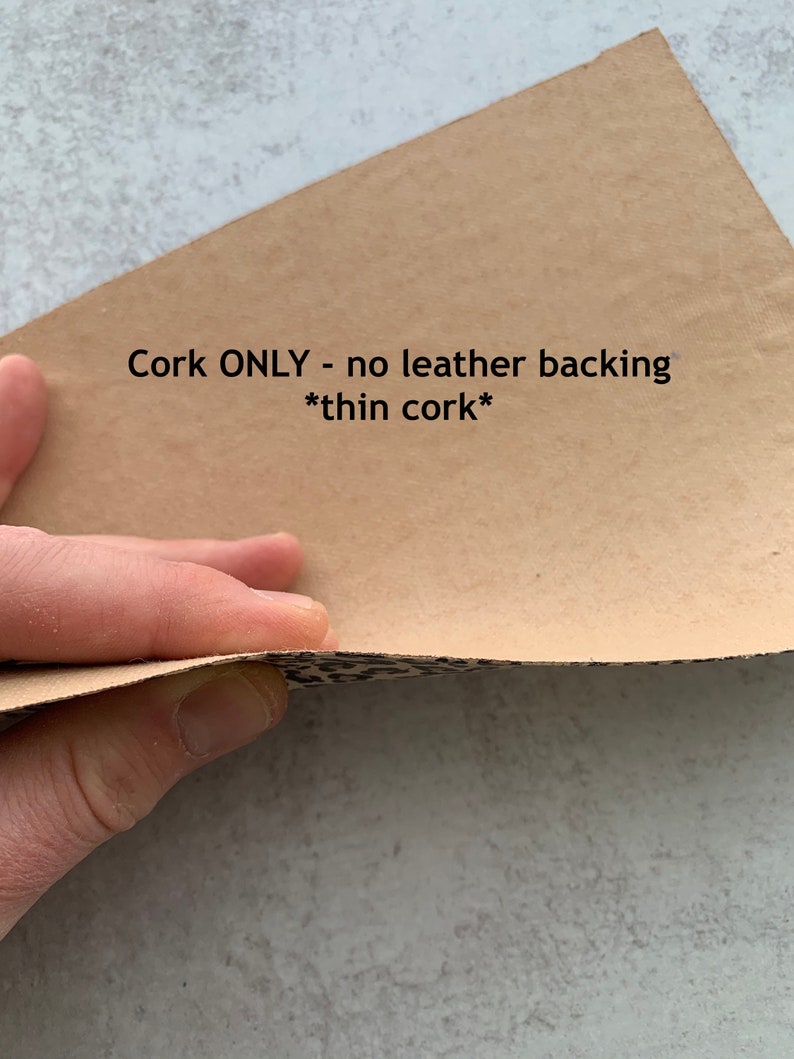 May include: Close-up of a piece of cork material with a leopard print pattern. The text "Cork ONLY - no leather backing *thin cork*" is visible on the cork.