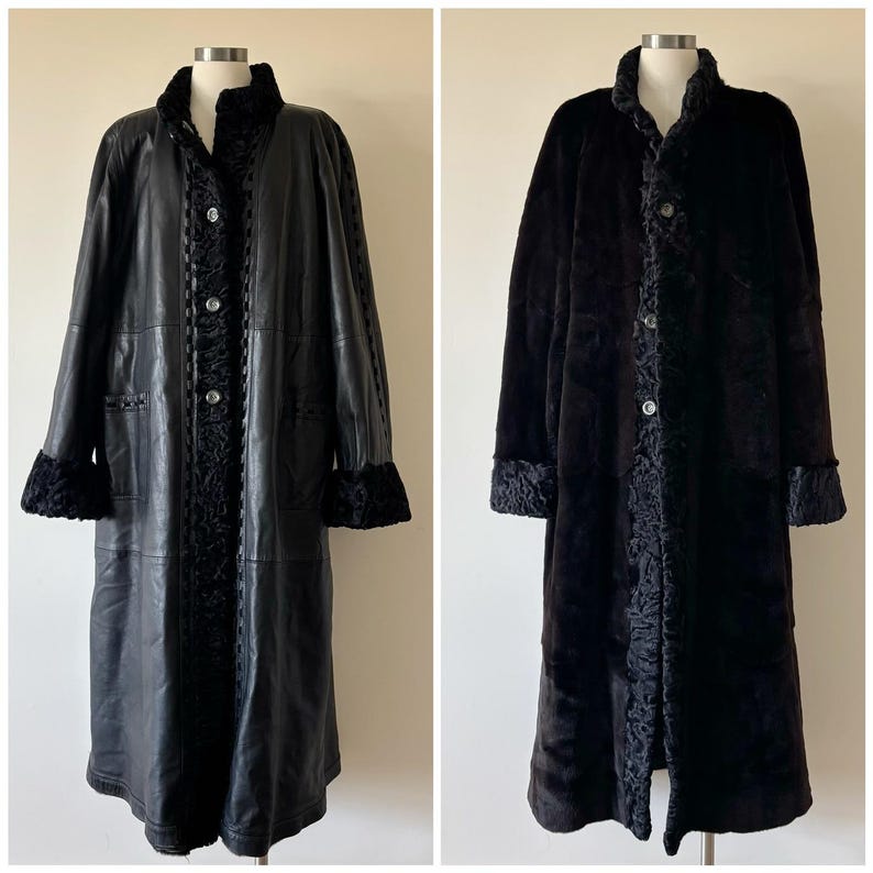 May include: A reversible long coat featuring a smooth black leather side with textured black fur trim on the collar, cuffs, and front placket, and a solid black fur side with a matching fur-trimmed collar, cuffs, and front button closure.
