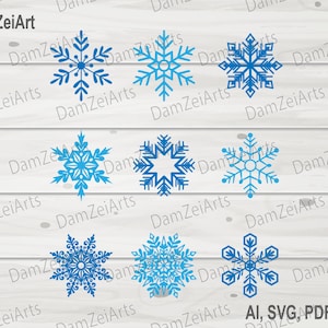 May include: A digital collection of nine distinct blue snowflake illustrations arranged in three rows. Each snowflake features a unique geometric pattern with intricate branches and points. The text DamZeiArt and AI, SVG, PDF, PNG is visible.