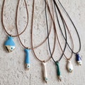 Greek Mati Fish Necklace, Evil Eye Sardine Pendant, Adjustable Faux Leather Cord product logo