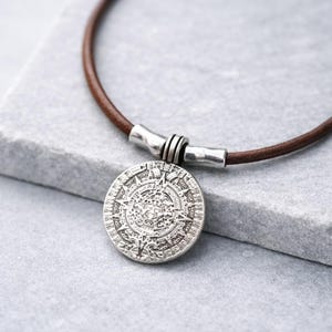 Silver Aztec Calendar Pendant Necklace for Men.  Ancient Sun Medallion on Brown Leather Cord. Minimalist Tribal Jewelry