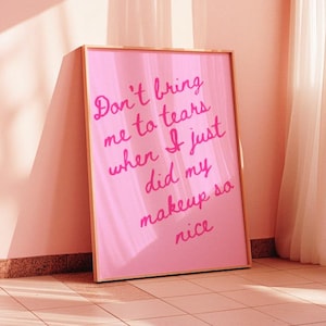May include: Pink framed print with the text "Don't bring me to tears when I just did my makeup so nice" in pink lettering.