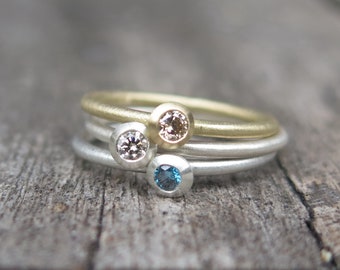 Diamond Stacking Ring Set 750 Gold &b. Silver with natural white and blue diamond also single!  Goldsmithing