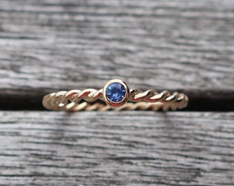 750 gold cord ring 2 mm with sapphire engagement ring