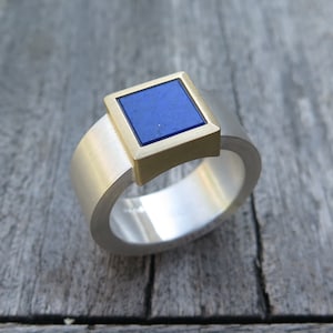 Fine silver with 750/- gold ring with lapis lazuli plate