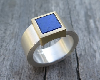 Fine silver with 750/- gold ring with lapis lazuli plate