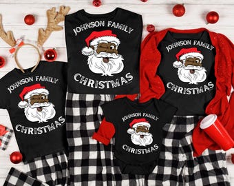 Camisetas navideñas a juego personalizadas para la familia de Papá Noel en color negro.