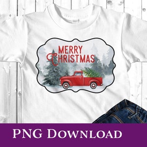 Op de afbeelding: Wit T-shirt met een rode vrachtwagen die een kerstboom vervoert in een zwart-witte ovale lijst. De lijst heeft de tekst "Merry Christmas" in rood.