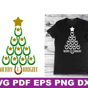 May include: A black t-shirt with a white design of a Christmas tree made of horseshoes. The tree has a gold star on top and the text "Merry & Bright" at the bottom.