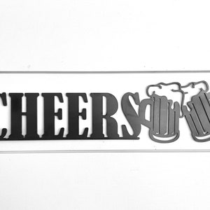 May include: Black metal wall decor with the word "CHEERS" and two beer mugs.