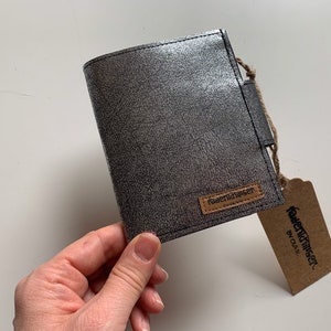 Wallet made of washable paper with RFID blocker