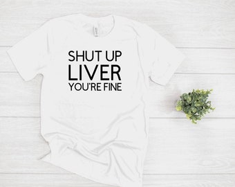 Cállate el hígado.  Eres una camiseta gráfica fina