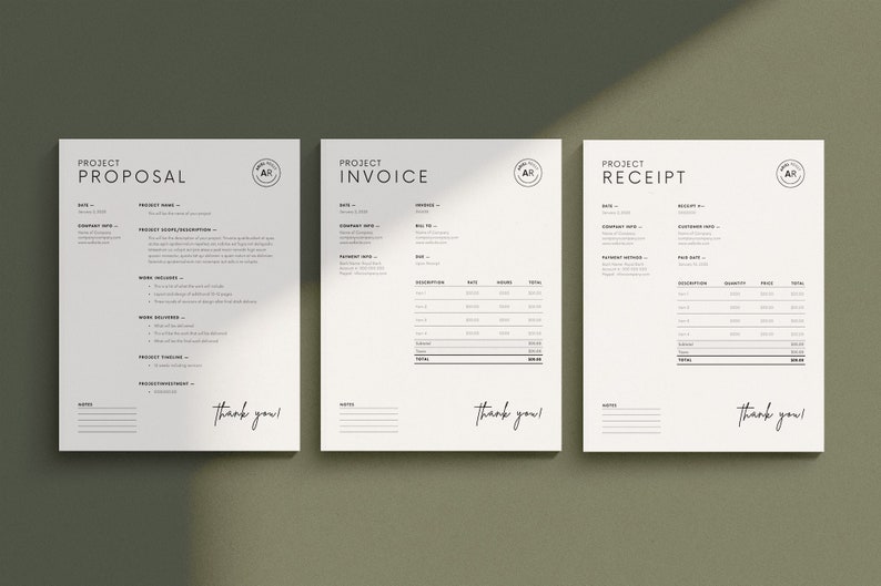 May include: Three white sheets of paper with the words "Project Proposal", "Project Invoice", and "Project Receipt" printed at the top. Each sheet has a black circle with the letters "AR" inside.