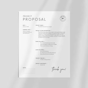 May include: A black and white project proposal template with the title "Project Proposal" and the text "Thank you!" at the bottom.