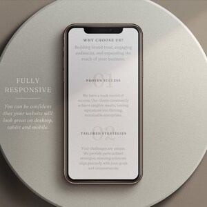 May include: A smartphone mockup on a white and brown background. The phone screen displays a website design with the text "Why Choose Us?" and "Proven Success" and "Tailored Strategies".