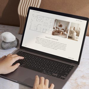 May include: A laptop computer displaying a presentation with a floor plan, a living room interior design, and a bedroom interior design. The presentation includes the text "Project Overview" and "Client Name".