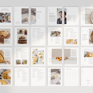May include: A cookbook with a white background and a minimalist design. The cover features the text "good eats" in a simple font. The pages are filled with recipes and photos of delicious food, including pancakes, bread, pasta, and more.