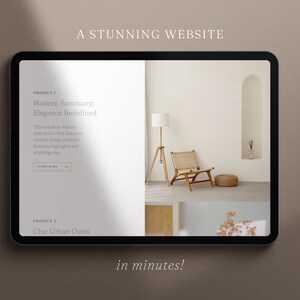 May include: A digital tablet displaying a website design with the text "A Stunning Website" and "in minutes!". The website showcases interior design projects, including a modern sanctuary with a chair, lamp, and decor. A white stylus rests beside the tablet.