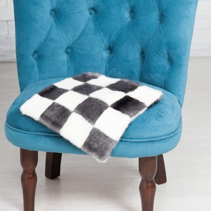 Faux fur chair pad by ARTFUR. Mink Iris & White