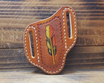 Saddle Tan Hand Made Leather Right Handed Pocket Knife Holster with Multi Colored Feather Tooling