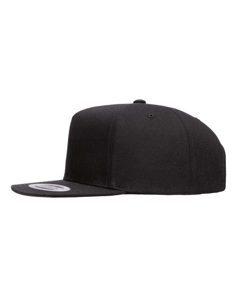 May include: A black flat brimmed baseball cap with a structured crown.